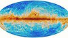 Polarized emission from Milky Way dust, which complicates the search for B-modes from the era of inflation, as seen by the Planck telescope. Credit: ESA and the Planck Collaboration